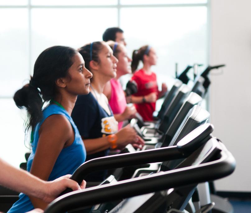 People exercising on treadmills at the Morris Recreation Center.